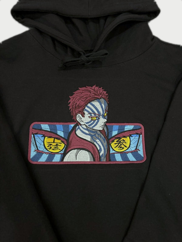 Akaza design embroidered on a black hoodie, made by NF Studio